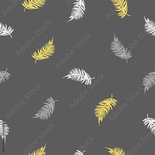 Seamless pattern of tropical leaves, plants, flowers on grey and yellow. Beautiful print with exotic plants. Botanical design of fabrics, wallpapers, natural cosmetics, perfumes.