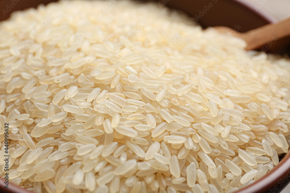 Bowl with raw rice, closeup Bowl with raw rice, closeup