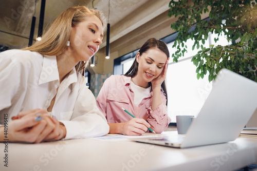 Two women entrepreneurs working together in office
