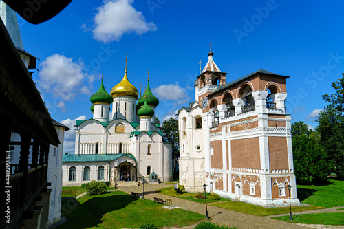 Suzdal, Russia. Spaso-Evfimiev monastery - Male monastery. Transfiguration Cathedral. Bell tower of the Nativity of St. John the Baptist photo