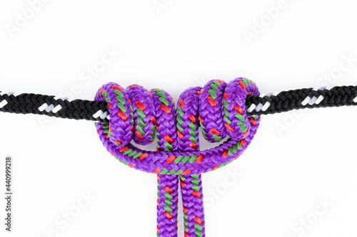 Prusik climbing knot on white background