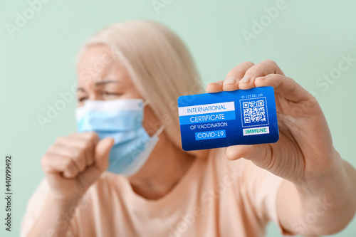 Ill senior woman with Inter...