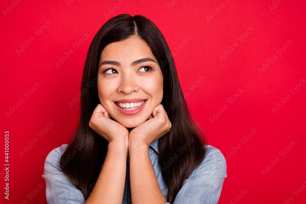 Portrait of attractive cheerful pensive girl creating solution copy space isolated over bright red color background Portrait of attractive cheerful pensive girl creating solution copy space isolated over bright red color background