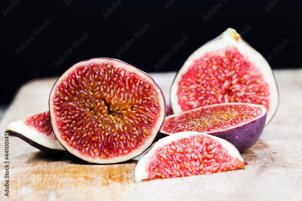 red delicious fig pulp with seeds , close up red delicious fig pulp with seeds , close up