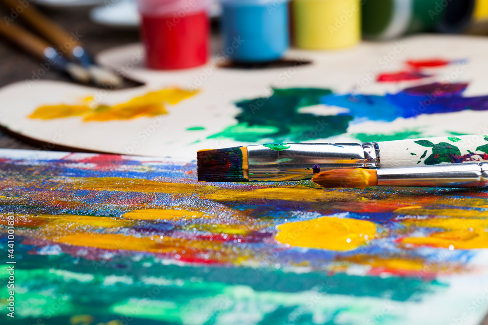 Fototapeta premium creative process of drawing by mixing different colors