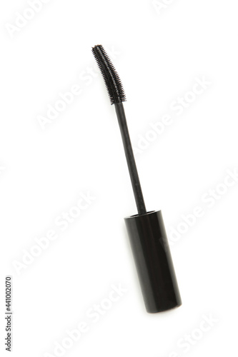Black mascara wand isolated on white background
