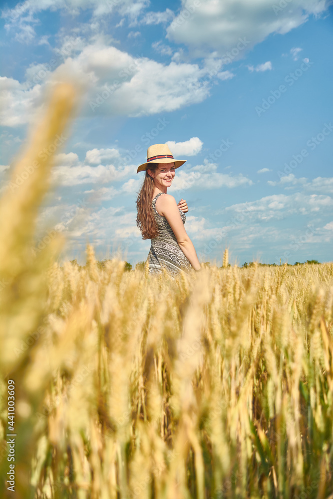 Young girl with long hair in a field Young girl with long hair in a field