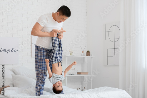 Happy father and his little...