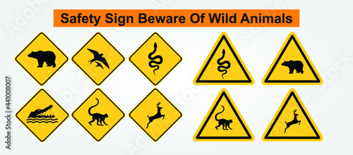 Safety sign beware of wild animals.  Beware of Bear,  Deer,  Snake,  Monkey, Bird, and Beware of Crocodile. photo