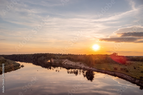 Aerial landscape of river Desna during the sunset. Beautiful calm atmosphere on the river in the evening