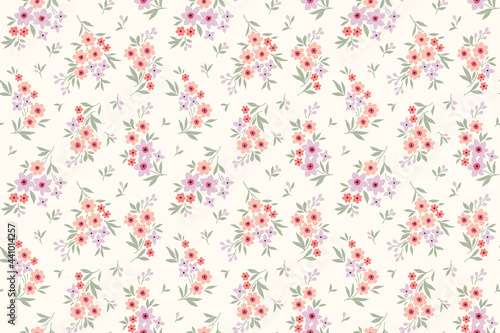 Vector seamless pattern. Pretty pattern in small flowers. Small pink coral and lilac flowers. White background. Ditsy floral background. The elegant the template for fashion prints.