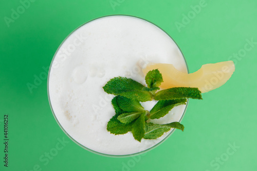 Pina Colada in front of green background