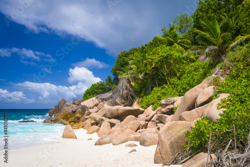 Stones at the wild Petite Anse beach on La Digue island, Seychelles © Aliaksandr