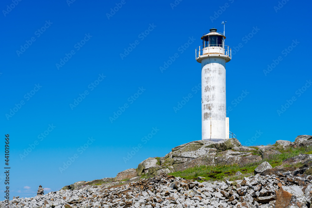 Subbe lighthouse with clear blue sky in Varberg, Sweden.