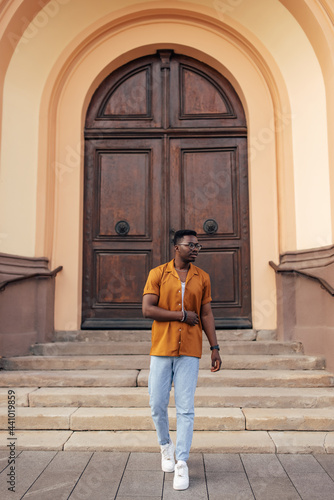 Wallpaper Mural Adult man, walking through the new town. Torontodigital.ca