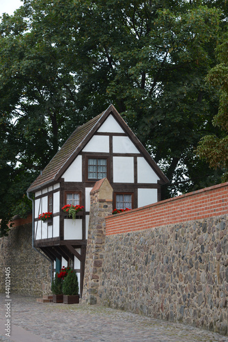 Side view of a historic Wiek house in the town of Neubrandenburg, Germany on a gloomy day