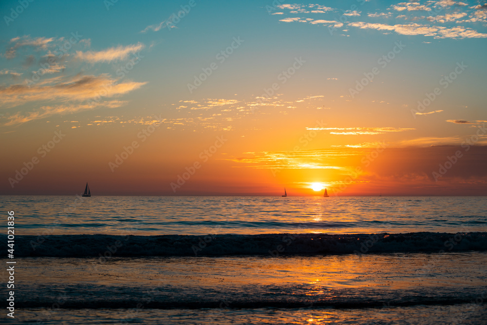 Sea beach with sunset sky abstract background. Copy space of summer vacation and travel concept.