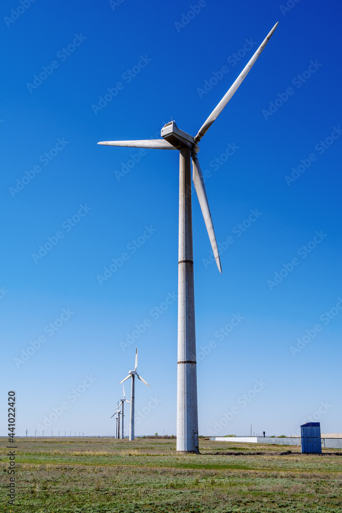 Wind turbines in the spring steppe. the picture was taken in Russia, in the Orenburg region Wind turbines in the spring steppe. the picture was taken in Russia, in the Orenburg region