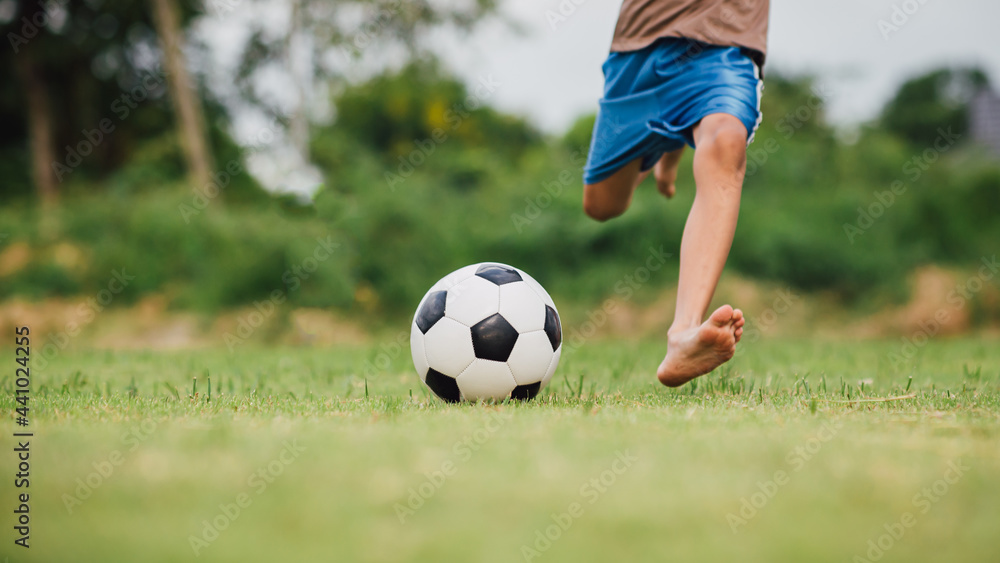 action sport outdoors of diversity of kids having fun playing soccer football for exercise in community rural area under the twilight sunset sky action sport outdoors of diversity of kids having fun playing soccer football for exercise in community rural area under the twilight sunset sky