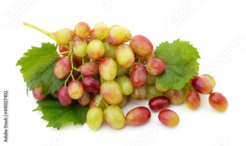 Green grapes with leaves.