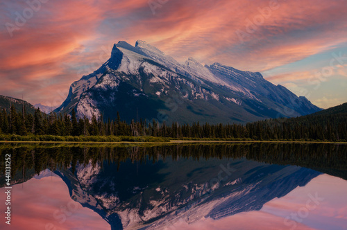 Vermilion Lakes sunset with Mount Rundle reflecting off the peaceful waters. photo