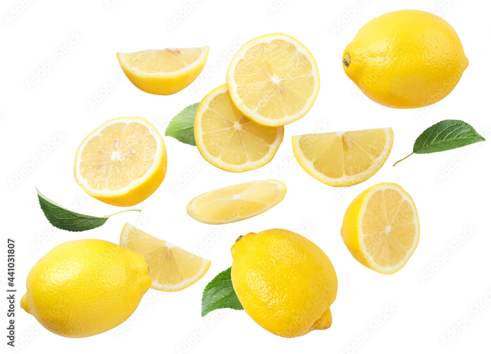 Whole lemons, slices and green leaves on a white background. Isolated