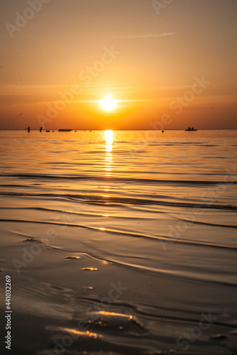 Summer sunset at sea. A resort place to relax at sunset. text place.