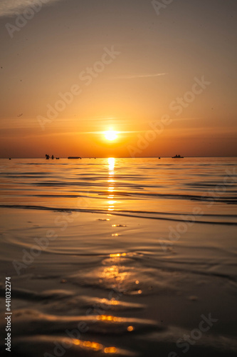 Summer sunset at sea. A resort place to relax at sunset. text place.