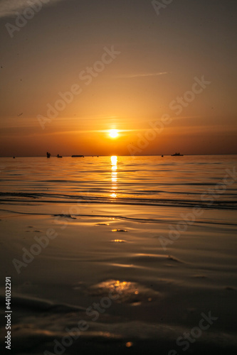 Summer sunset at sea. A resort place to relax at sunset. text place.