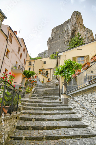 A small street between the old houses of Pietrabbondante, a medieval village in the mountains of the Molise region in Italy.