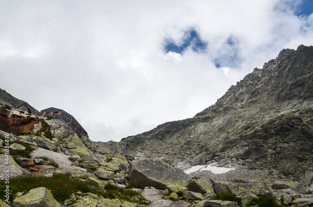 Beautiful mountain landscape with Chata pod Rysmi a hut of the foot of mount Rysy on the High Tatra mountains in Slovakia