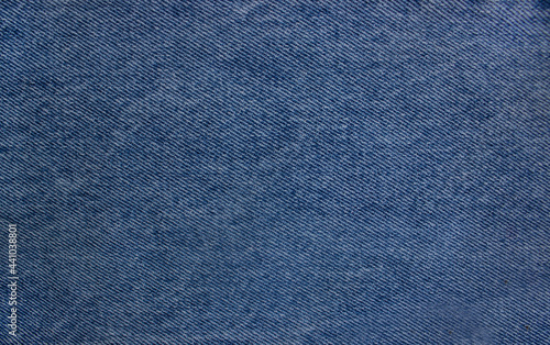 Close-up texture of denim color fabric or cloth in denim color. Fabric texture of denim background