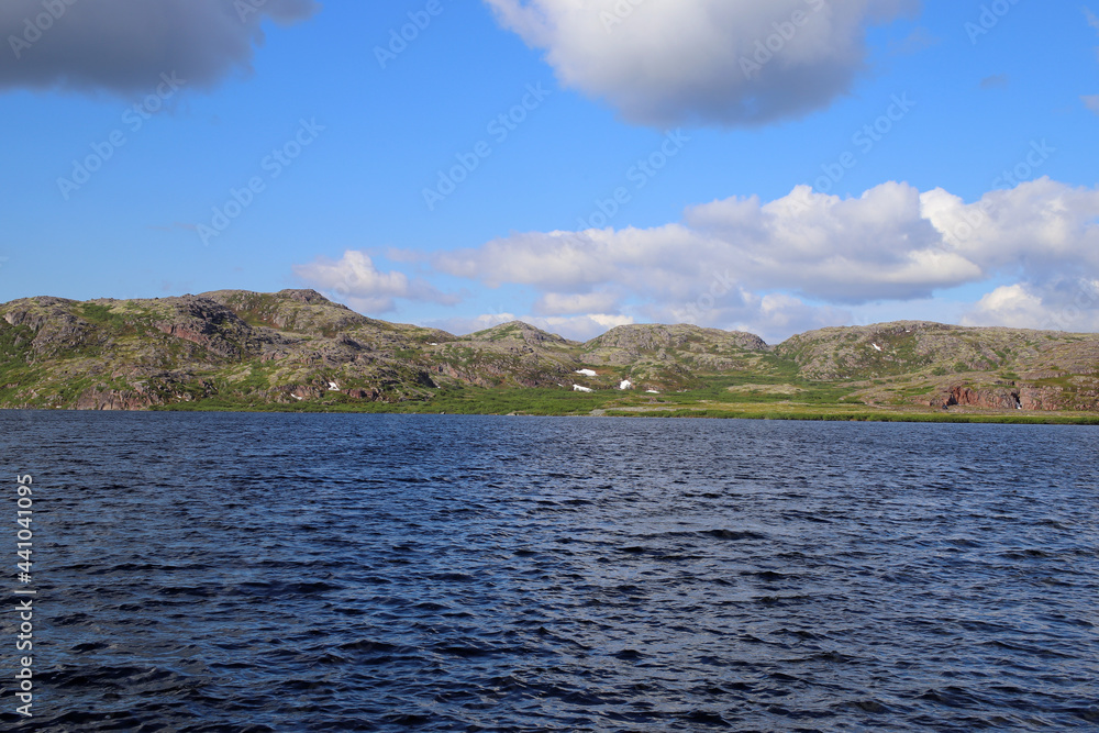 blue waters of the northern lake on the background of the tundra blue waters of the northern lake on the background of the tundra
