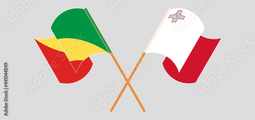 Crossed and waving flags of Republic of the Congo and Malta