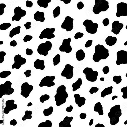 Abstract modern dalmatian fur seamless pattern. Animals trendy background. Black and white decorative vector illustration for print, card, postcard, fabric, textile. Modern ornament of stylized skin