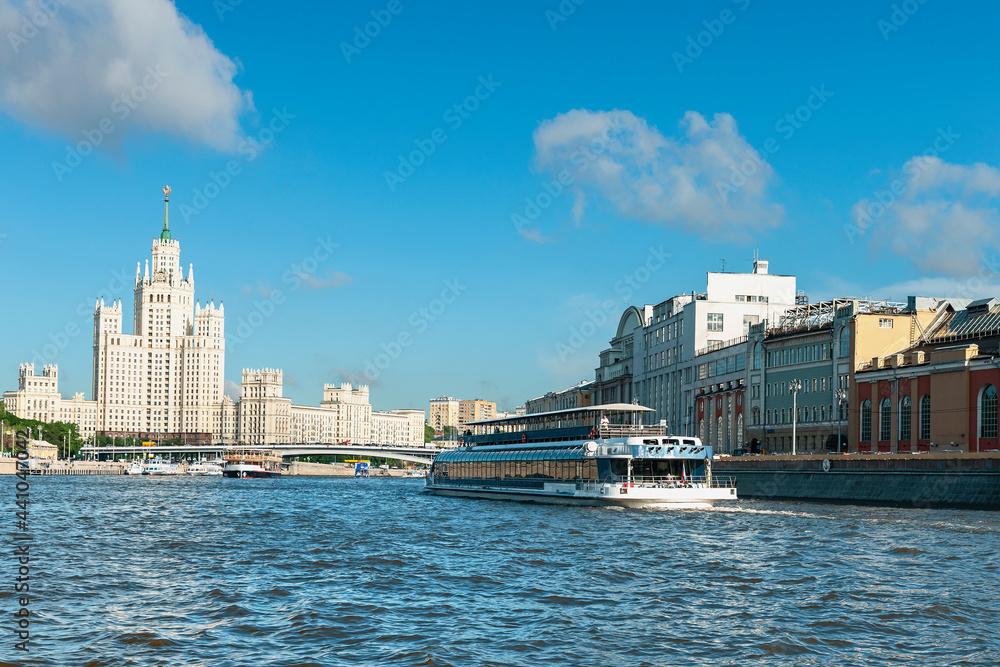 river tourist ships sail along the Moskva River near Kotelnicheskaya embankment