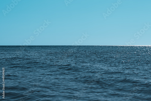 macro texture of the water surface, blue sea waves. © Ренат Хисматулин