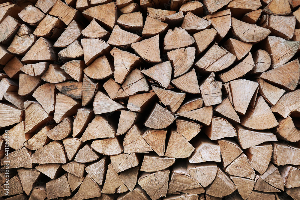 Background with firewood in a pile Background with firewood in a pile