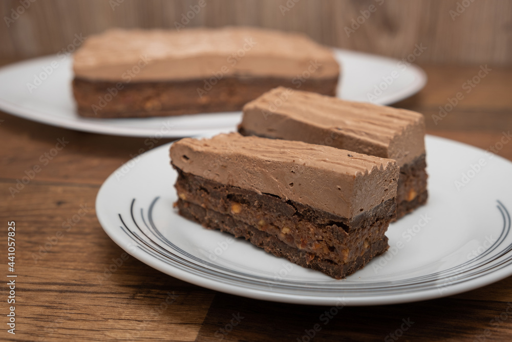 Sliced homemade sweet caramel and nut cake