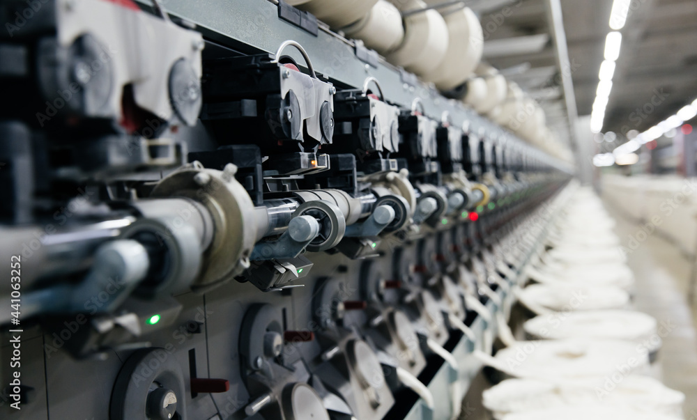 The process of machine operation in a textile factory for the production of cotton thread and yarn The process of machine operation in a textile factory for the production of cotton thread and yarn