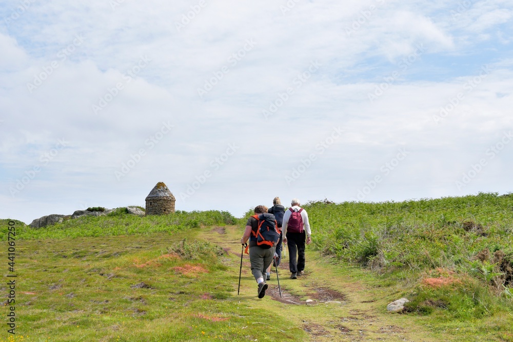 Hikers on the Brehat island in Brittany. France