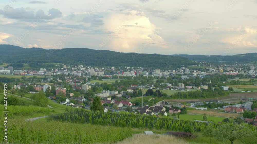 Timelapse panoramic view of the city. Fast moving cumulus clouds. Canton Zurich. Switzerland.