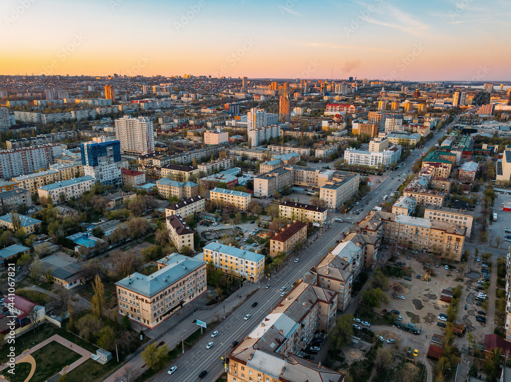 Evening spring Volgograd cityscape at sunset, aerial view