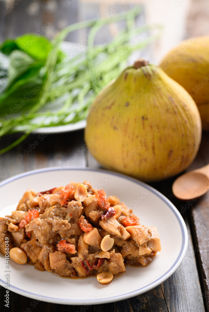 Thai food (Tum Kraton), Spicy santol salad with dry shrimp and peanut eating with fresh vegetables, Local Thai food Thai food (Tum Kraton), Spicy santol salad with dry shrimp and peanut eating with fresh vegetables, Local Thai food