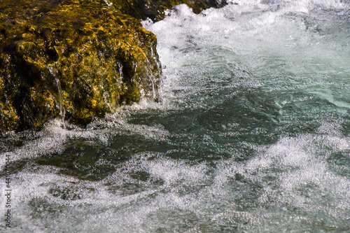 Closeup shot of a flowing river photo