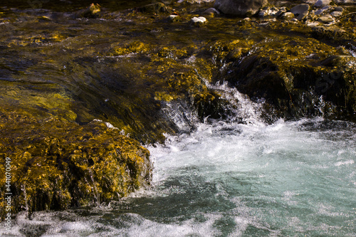 Closeup shot of a flowing river photo