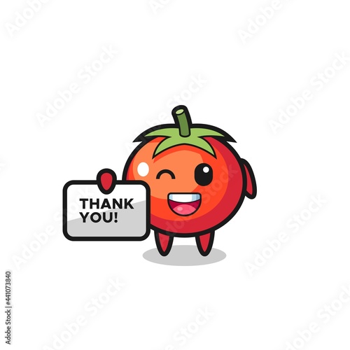 the mascot of the tomatoes holding a banner that says thank you