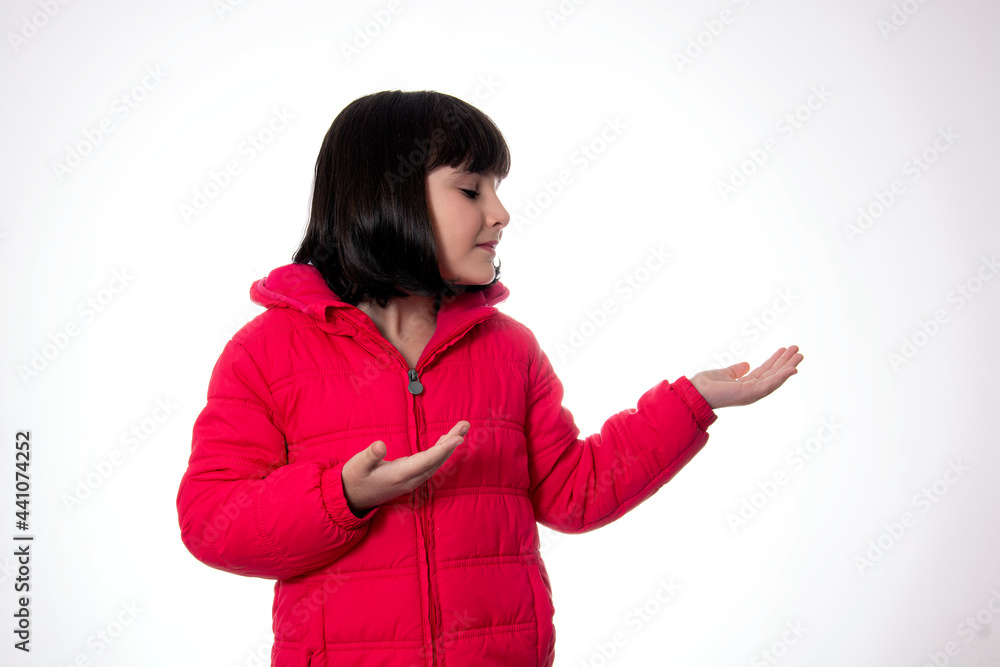 girl wearing red coat on white background presenting girl wearing red coat on white background presenting