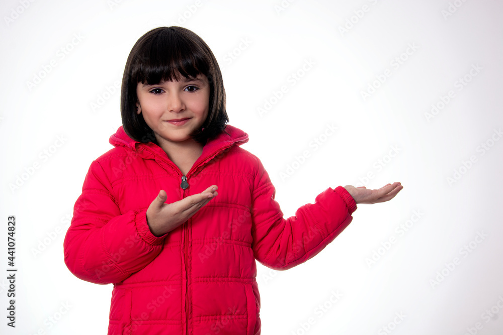 girl wearing red coat on white background presenting girl wearing red coat on white background presenting