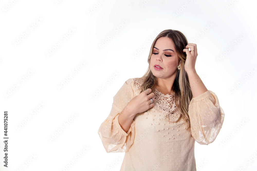 blonde woman on white background with hand in hair blonde woman on white background with hand in hair